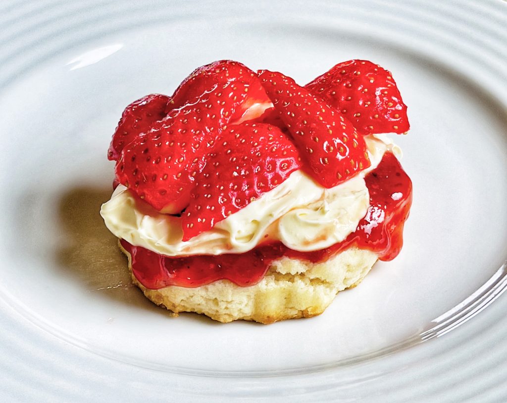 scone with clotted cream and strawberry jam